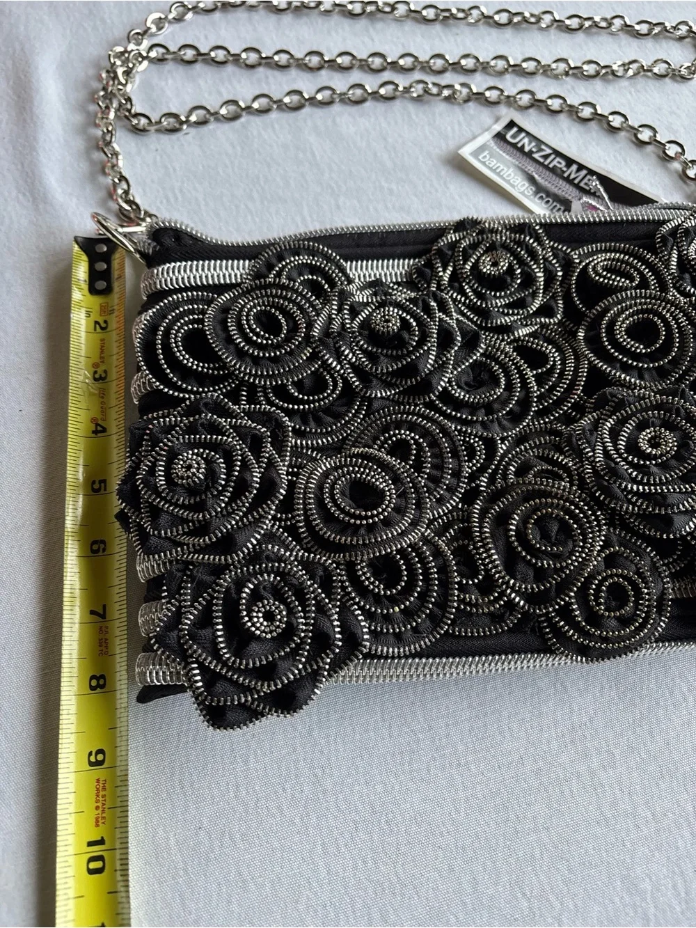 black and silver bag by BAM Bag